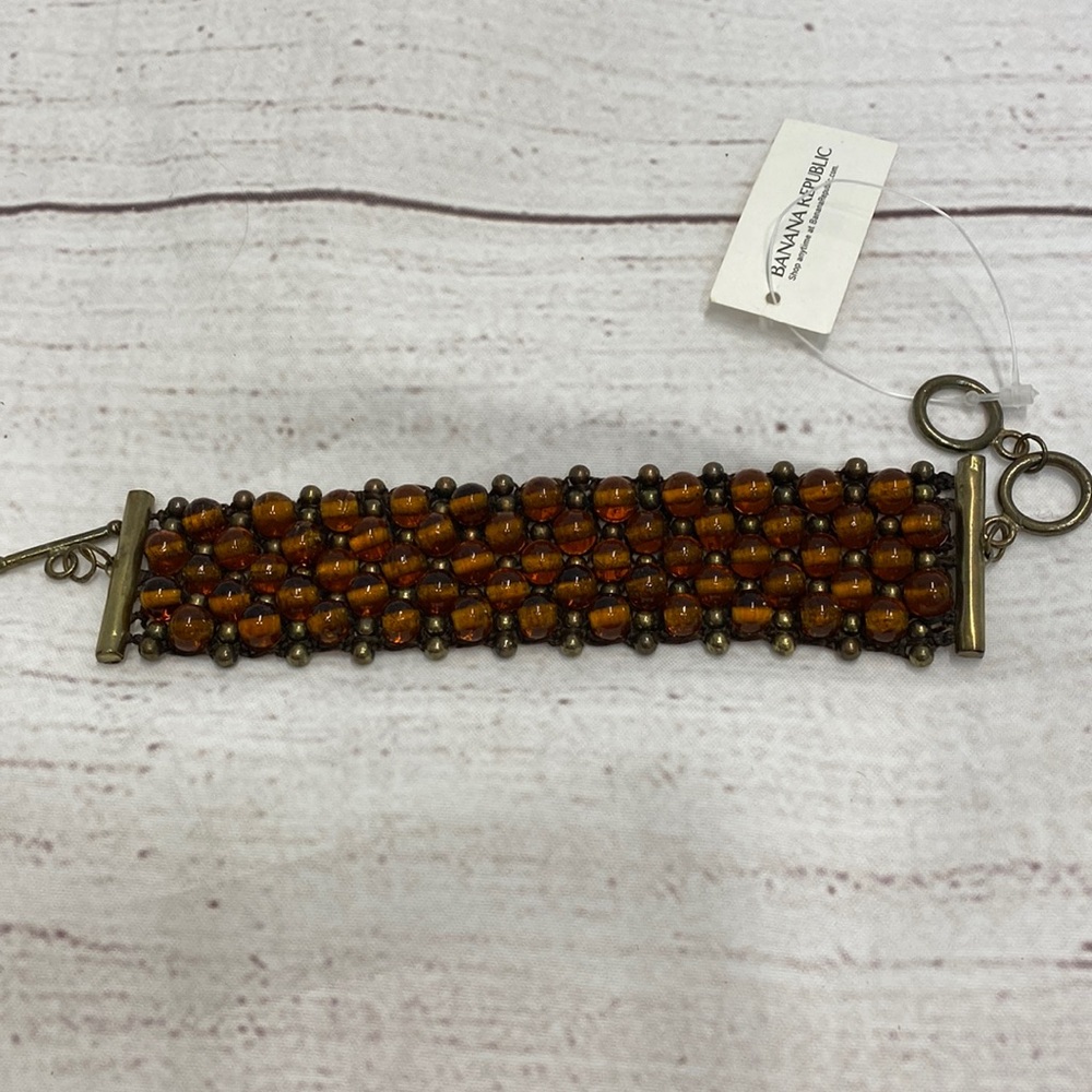 Brown glass bead with gold wide bracelet Banana Republic $35